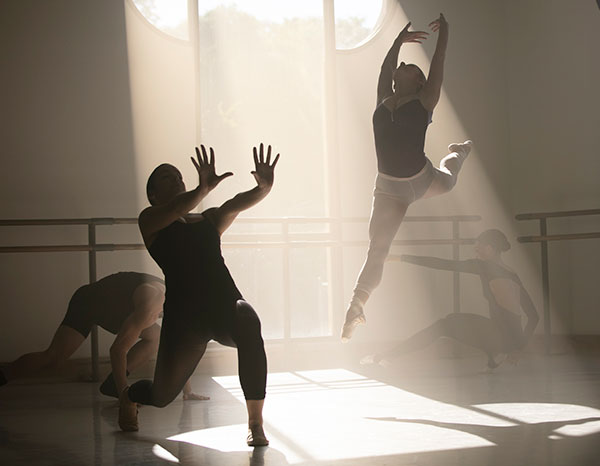 Dance students rehearse in the studio.