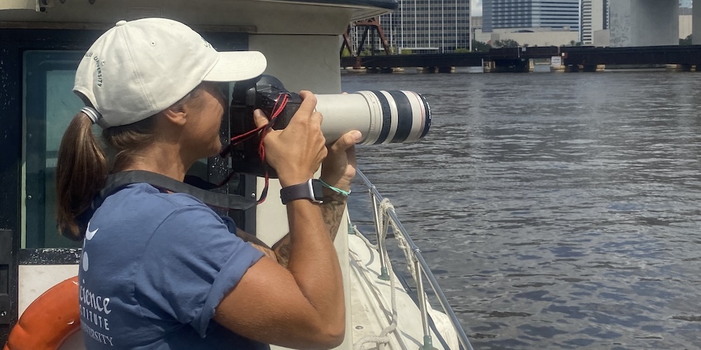 Dr. Mancia conducts visual survey in St. Johns River