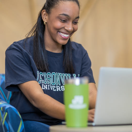 a student working on her laptop