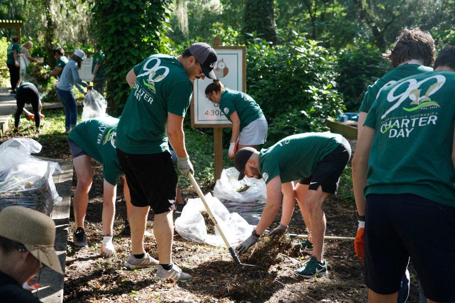 Charter Day Volunteers working at JU Campus