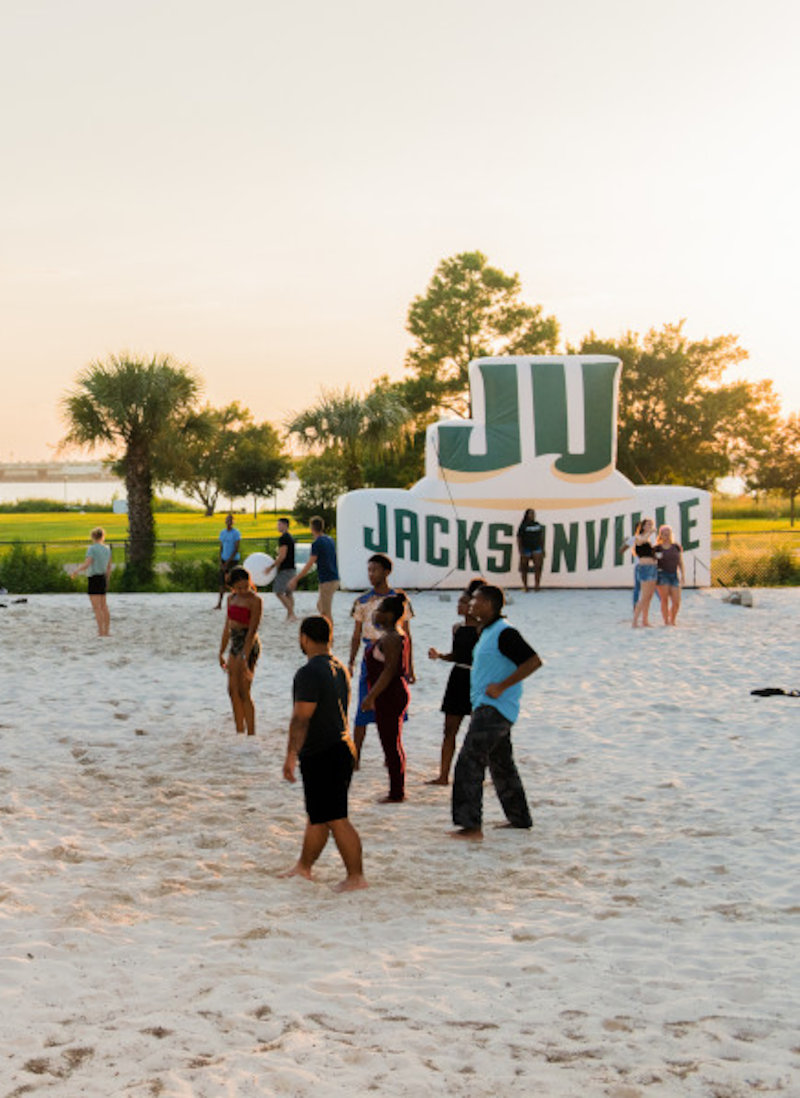 JU Students playing sand volleyball