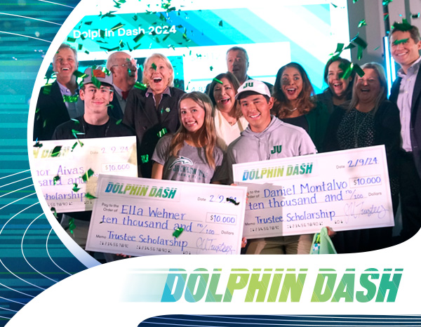 Students receiving their scholarship checks at Dolphin Dash 2024