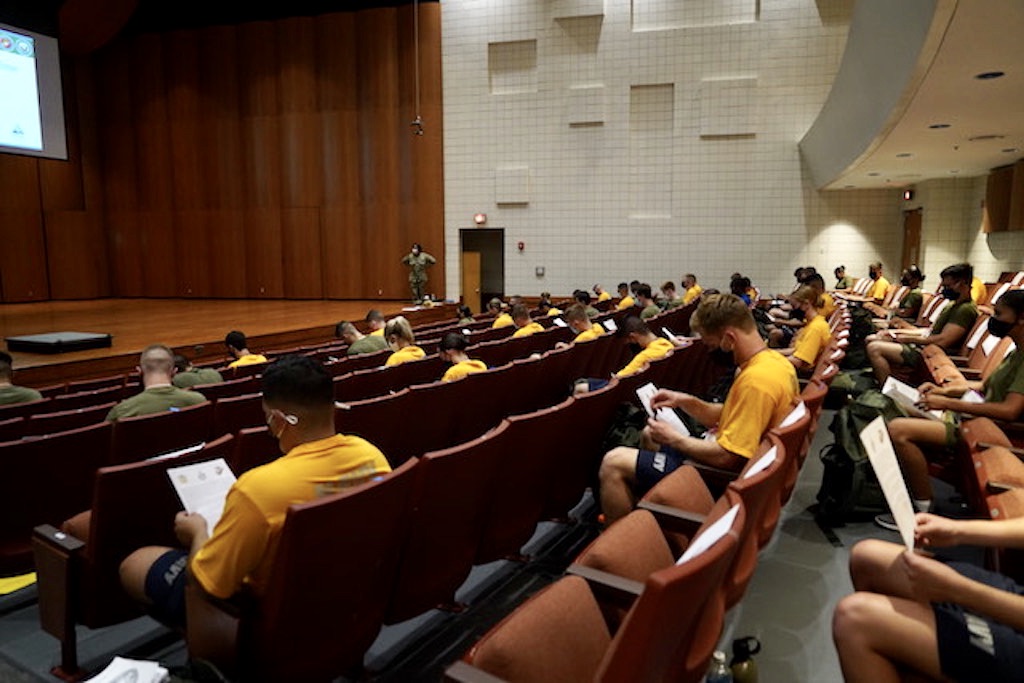 NROTC students seated in concert hall