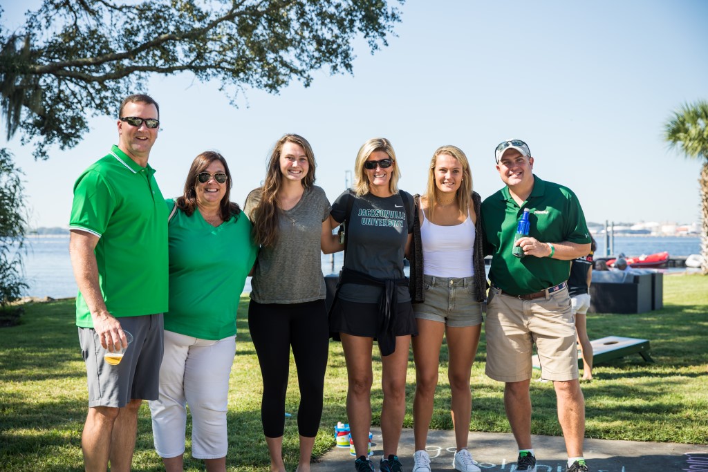 A JU family posing for a picture during Homecoming. 