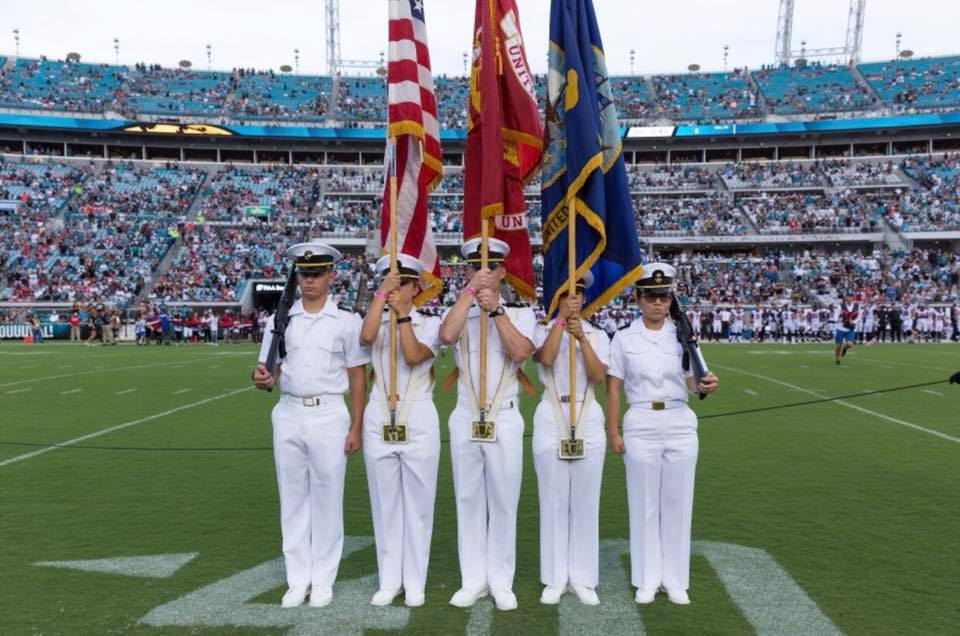 Midshipmen conducting a color guard